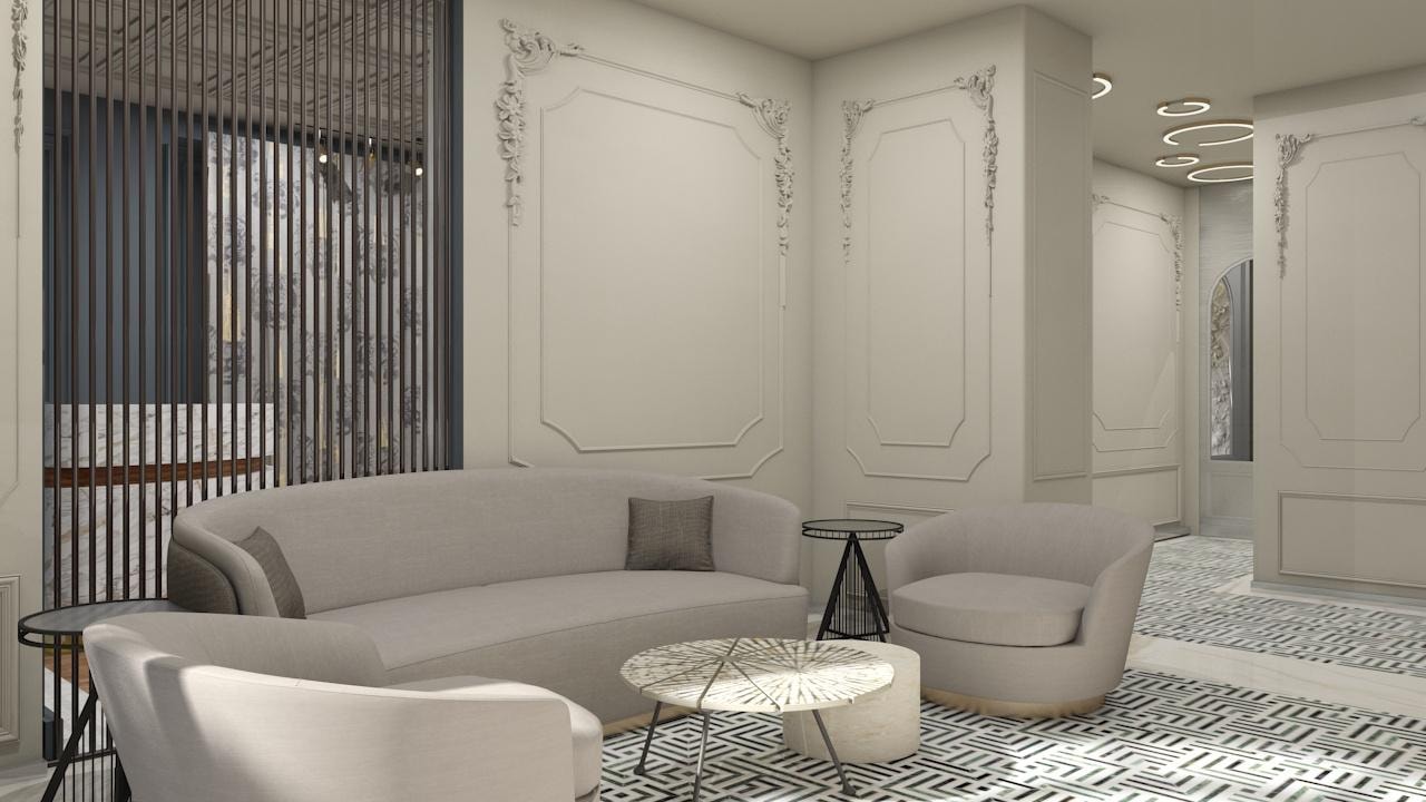 Hotel lobby seating area with premium upholstery, marble surfaces and accent lighting